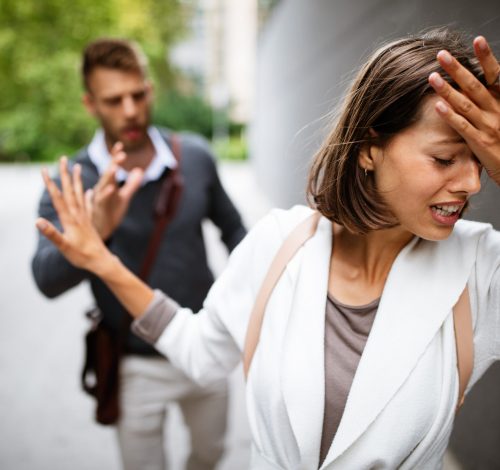 Breakup of a couple with man and sad girlfriend outdoor. Divorce, couple, love, pain concept.